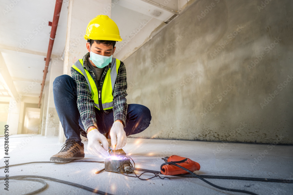 Construction workers carelessly connect wires causing unconscious electric shocks. Accident
