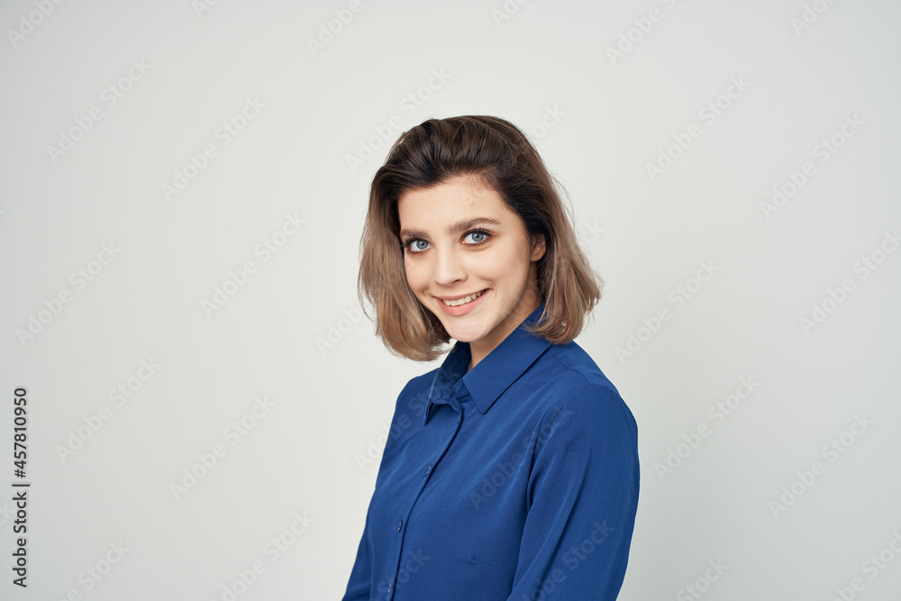 woman in blue shirt wearing glasses fashion cropped view light background woman in blue shirt wearing glasses fashion cropped view light background