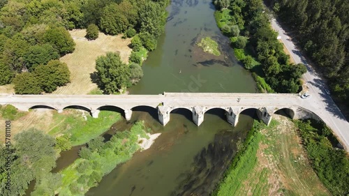 Aerial view of Nineteenth-century bridge over the Yantra River, known as the Kolyu Ficheto Bridge in Byala, Ruse region, Bulgaria photo