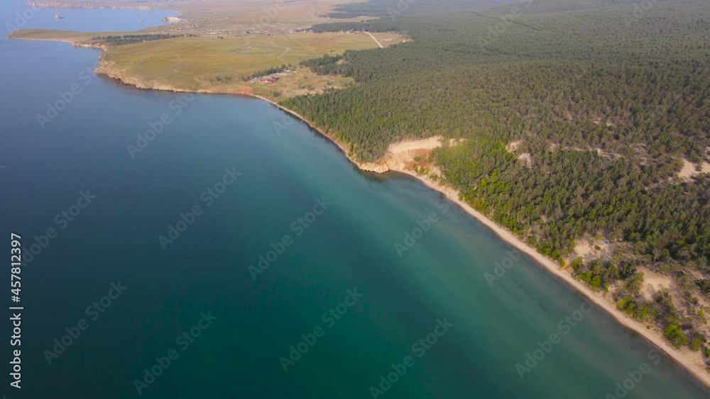 The picturesque shore of the Sarai beach. A trip to Lake Baikal. The picturesque shore of the Sarai beach. A trip to Lake Baikal.