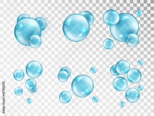 Water bubbles set isolated on transparent background. Cosmetic aqua. Realistic blue bubbles with reflection