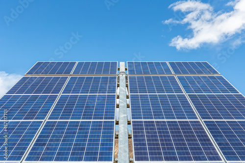 solar panels against a blue sky