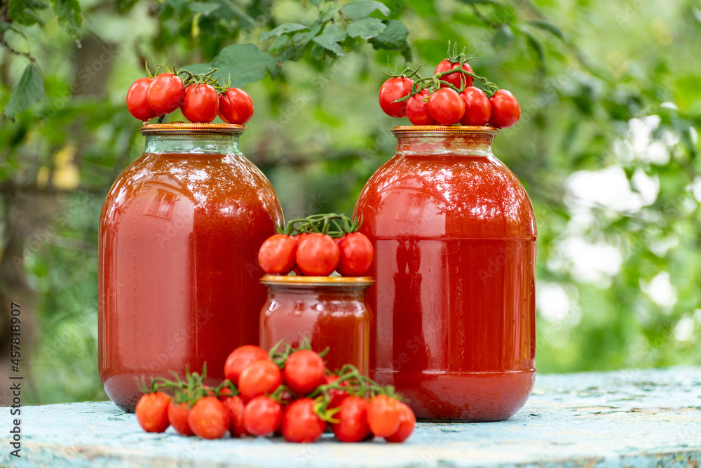Homemade tomato juice and the fresh tomatoes Homemade tomato juice and the fresh tomatoes