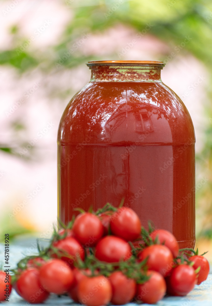 Homemade tomato juice and the fresh tomatoes Homemade tomato juice and the fresh tomatoes