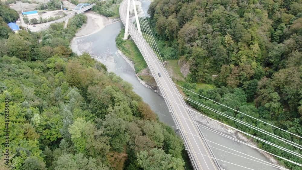 Aerial view of cable-stayed bridge on the road to Krasnaya Polyana. Sochi, Russia. Aerial view of cable-stayed bridge on the road to Krasnaya Polyana. Sochi, Russia.
