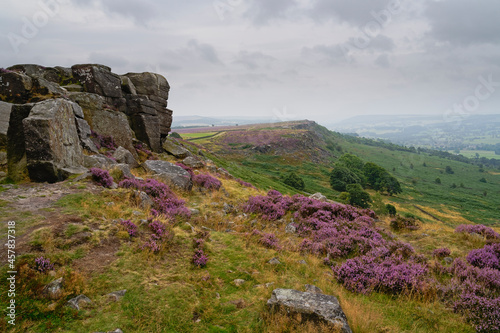 From Curbar Edge over to Baslow Edge in the Derbyshire Peak District on a grey damp summer morning. photo