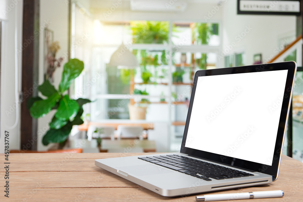 custom made wallpaper toronto digitalComputer notebook and mouse with a coffee shop behind the scenes Blur coffee shop