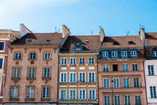 Facade of old classic buildings in Warsaw  Poland