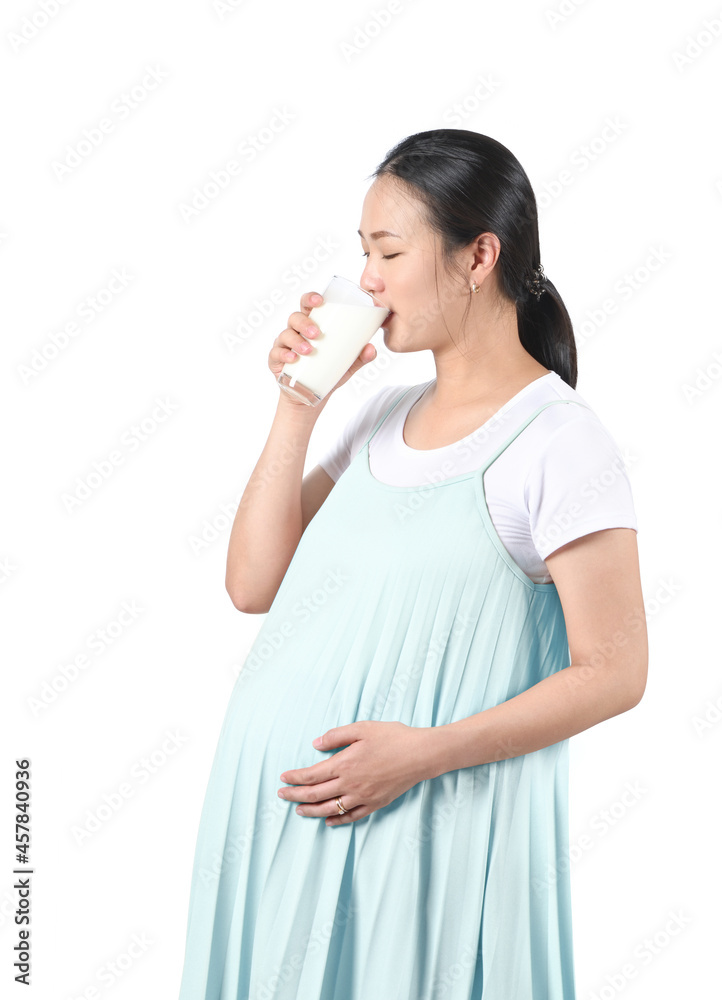 Young asian pregnant drinking fresh milk isolated on white background. Young asian pregnant drinking fresh milk isolated on white background.