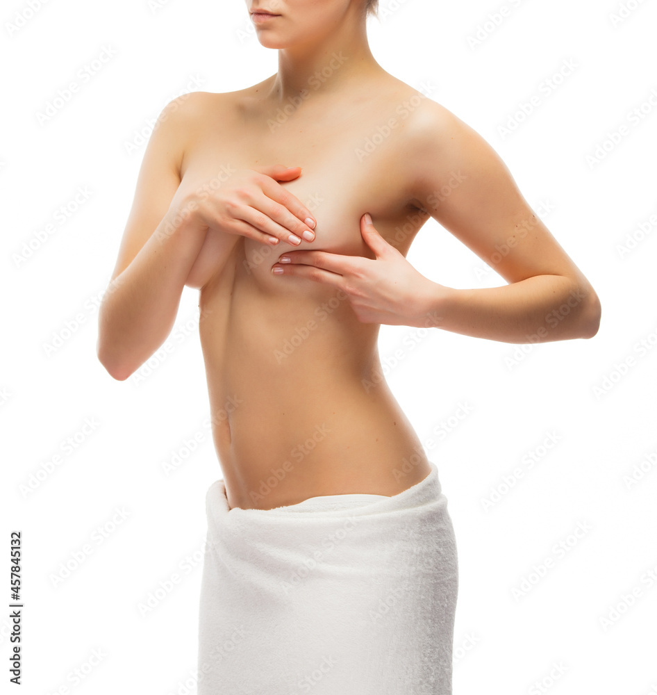 Woman examining breast isolated on white background
Woman examining breast isolated on white background