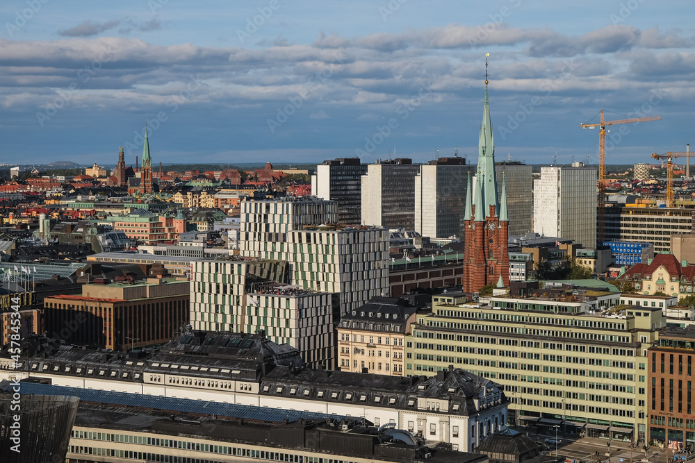 View of the center of Stockholm from above with the mix of old and new buildings , cathedrals and Central railway station in the front