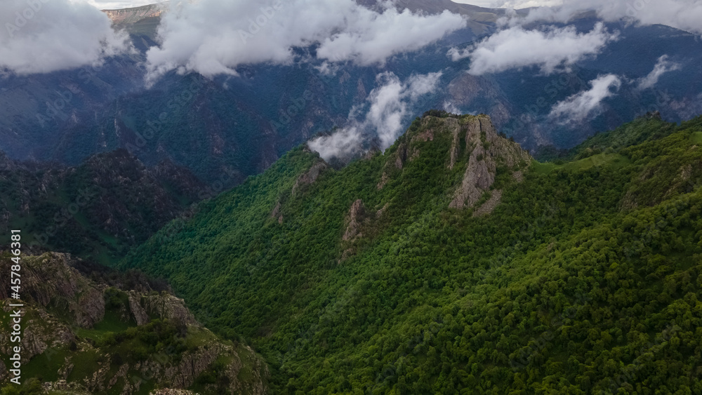 Rocky Mountain Pinnacales Covered with Green Grass