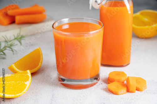 Orange and carrot juice, healthy smoothie. Healthy food, nutrition and diet concept