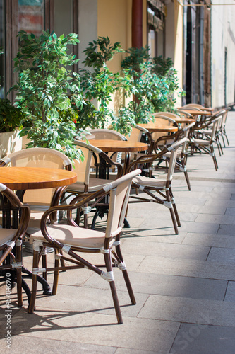 outdoor tables in cafes. Summer veranda of the restaurant © Светлана Высокос
