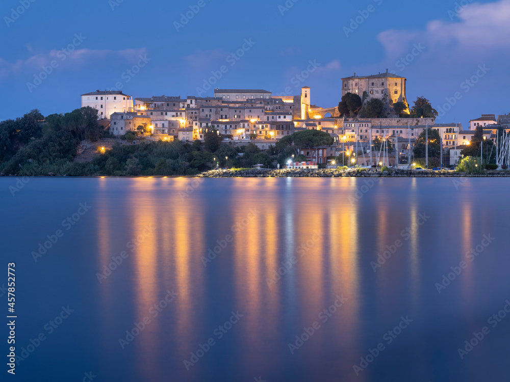 night lights of city Capodimonte on lake Bolsena in Italy