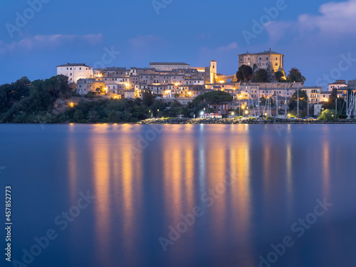 night lights of city Capodimonte on lake Bolsena in Italy
