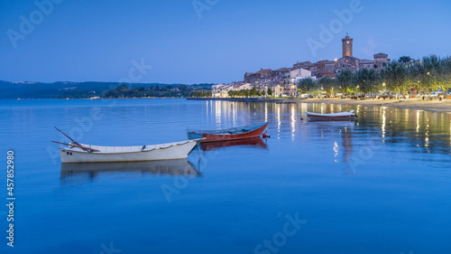 panoramic view to boats on lake Bolsena in city Marta in Italy