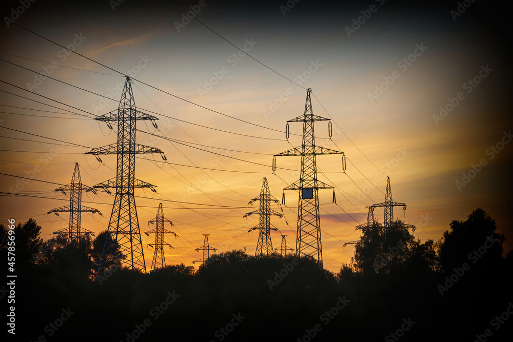 High voltage electric industrial gear against the backdrop of a picturesque sunset