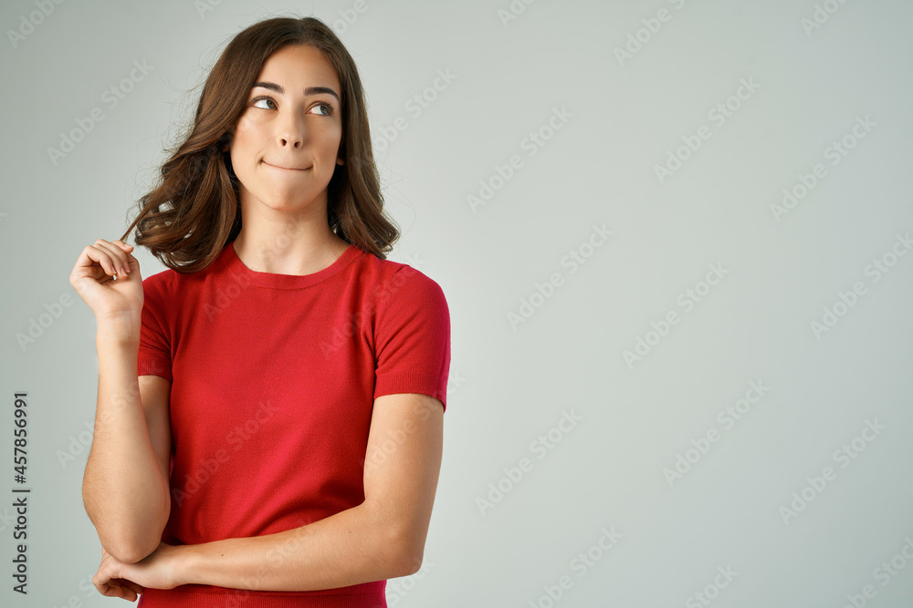 beautiful woman surprised look holding hair Studio Lifestyle beautiful woman surprised look holding hair Studio Lifestyle