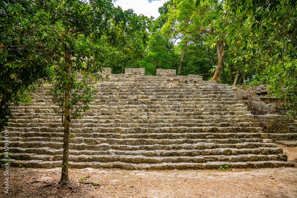 Nohoch Mul Pyramid in Coba. Pyramid and temple with stone steps in the Maya ruins of Coba Nohoch Mul Pyramid in Coba. Pyramid and temple with stone steps in the Maya ruins of Coba