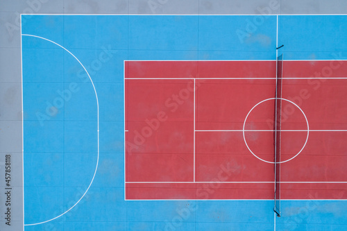 Tennis and futsal court seen from a drone, zenithal shot.