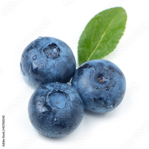 Fresh blueberries with leaves. Berry isolated on white background