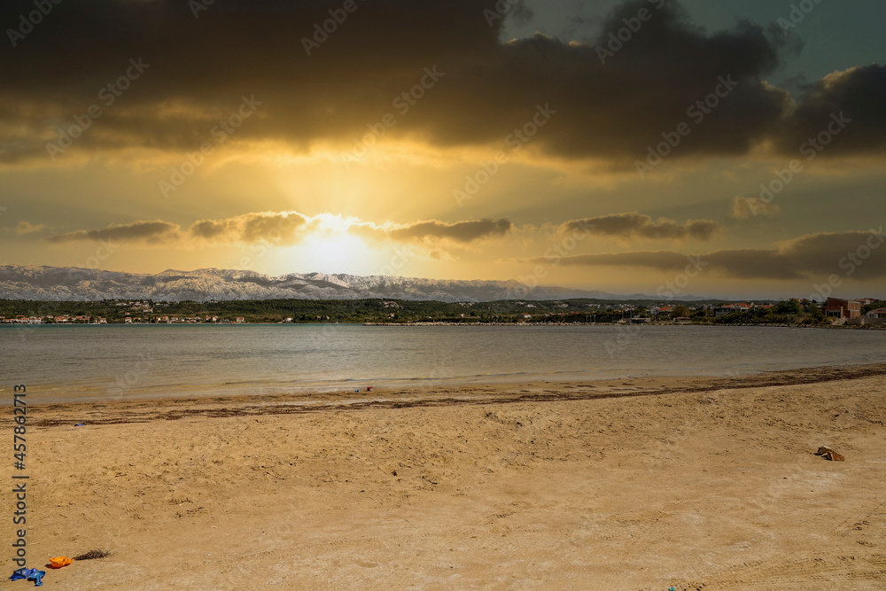 a lonely beach in ljubac in croatia