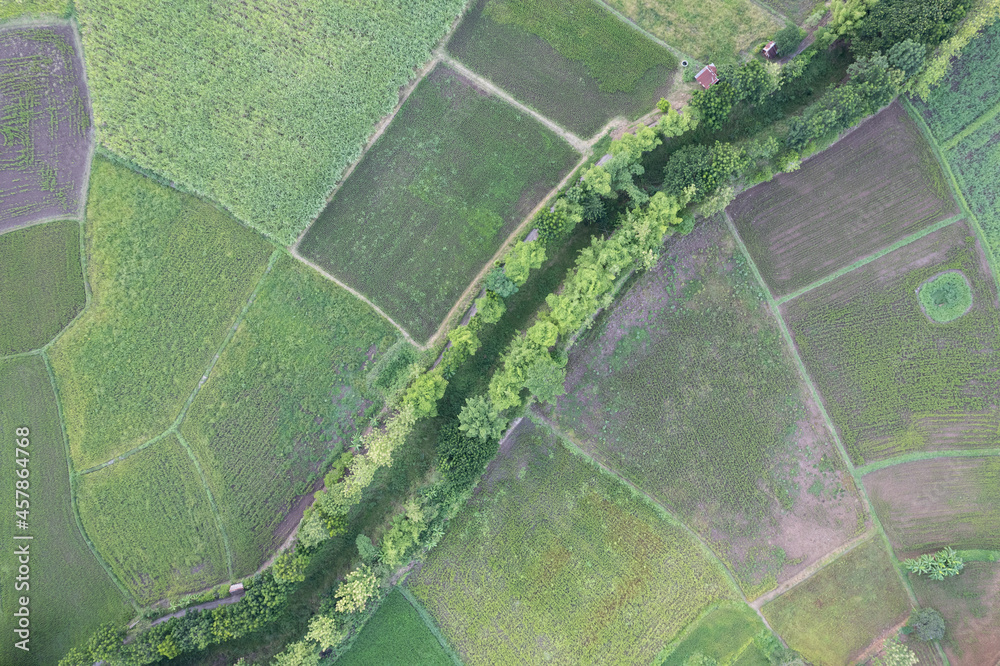 Obraz premium aerial view farm land of drone with high view of local agriculture land