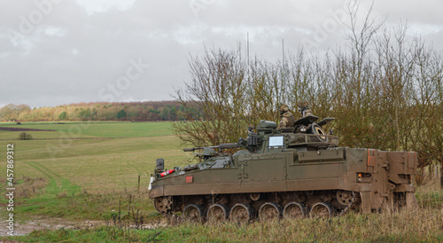 army infantry fighting vehicle in action on a military exercise