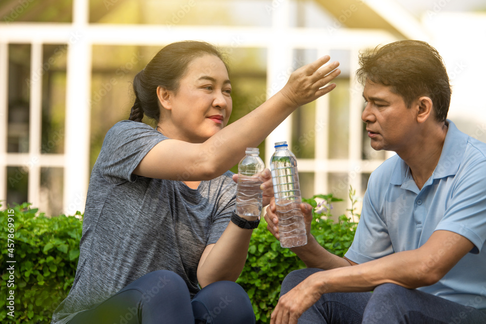 Retired couple exercising happily and healthy, retirement age exercise, Elderly life insurance Retired couple exercising happily and healthy, retirement age exercise, Elderly life insurance