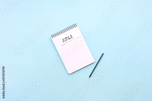Obraz na płótnie Top view of empty notebook ready for New 2022 Year resolutions or wish list. w salonie