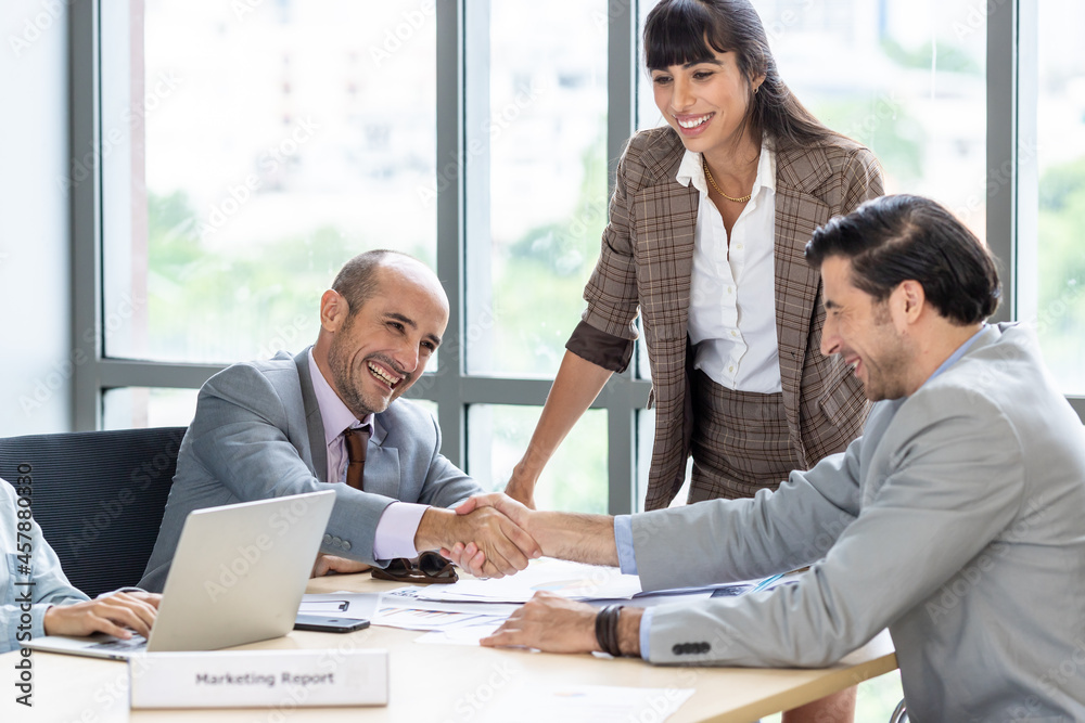 Businesspeople discussing together in the conference room during meeting at the office. Businesspeople discussing together in the conference room during meeting at the office.