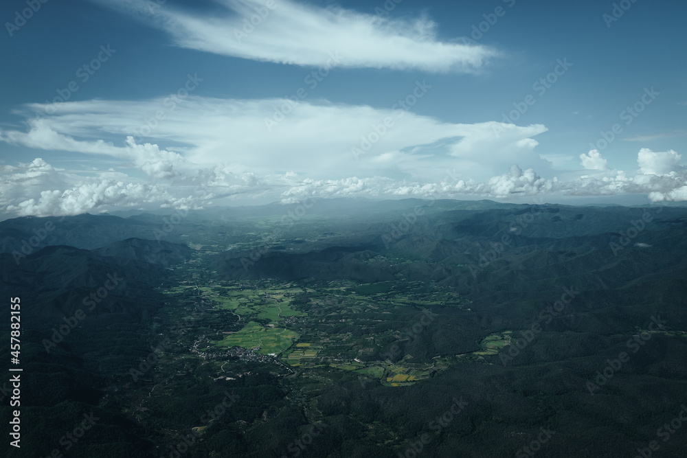 Aerial view of agricultural field surrounded by the hill in countryside of Chiang mai Thailand ,calm and mind fulness concept