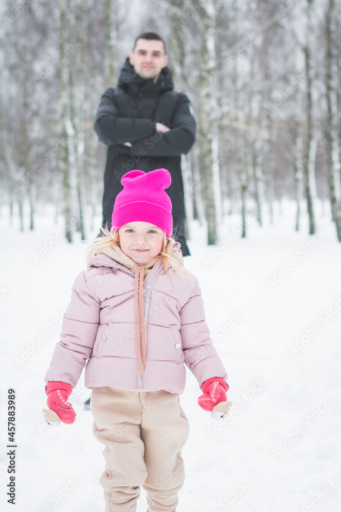 Beautiful little girl playing with her father Beautiful little girl playing with her father