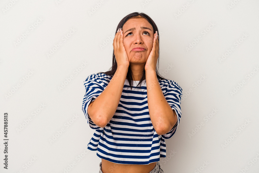 Young latin woman isolated on white background whining and crying disconsolately. Young latin woman isolated on white background whining and crying disconsolately.