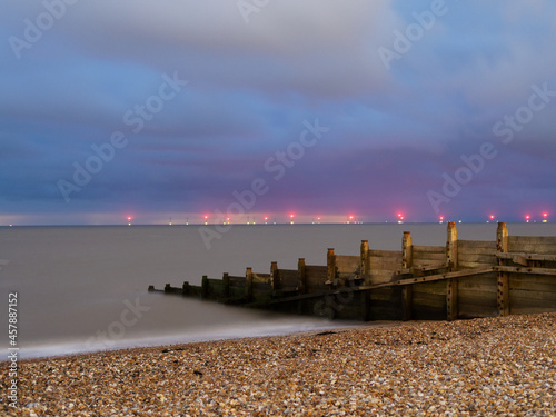 Goyne Water Ocean Breaker with Wind farm Lights in Background at Whitstable Beach © Mark Tyson