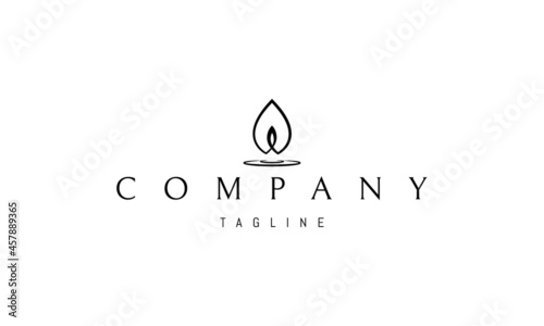 Vector logo on which an abstract image of a candle in the form of a leaf.