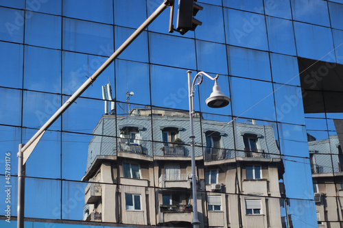 Building reflected in another building with mirror windows © Stefana