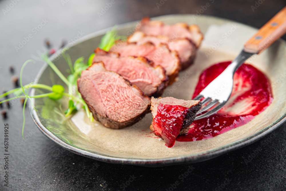 duck breast meat and garnish poultrysecond course side dish fresh ready to eat meal snack on the table copy space food background duck breast meat and garnish poultrysecond course side dish fresh ready to eat meal snack on the table copy space food background