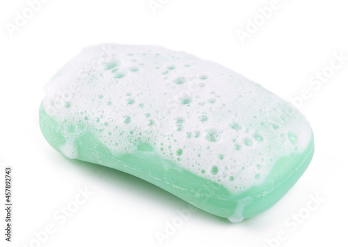 Green soap bubble isolated on a white background