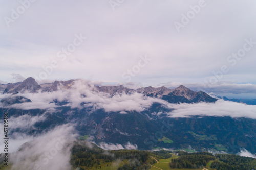 Fototapeta Naklejka Na Ścianę i Meble -  Epic Mountain Clouds Mist in Austria at Sunset Sunrise