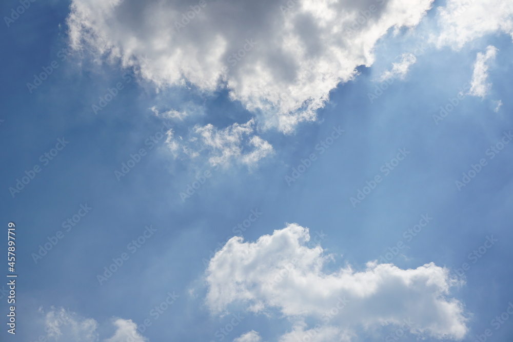 the sight of white clouds welcoming each other in afternoon sky the sight of white clouds welcoming each other in afternoon sky