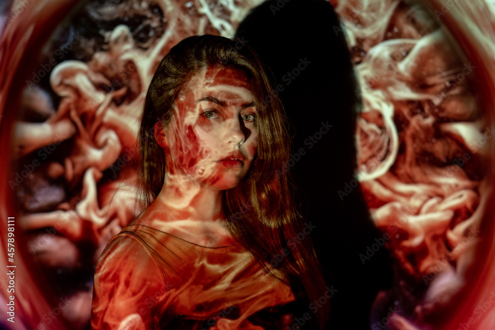 Art portrait. Soul energy. Zen life. Philosophy power. Calm relaxed woman in double exposure abstract red white color aura cloud smoke flow motion.