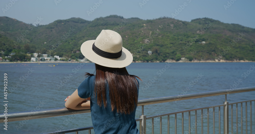 Woman enjoy the sea view in countryside