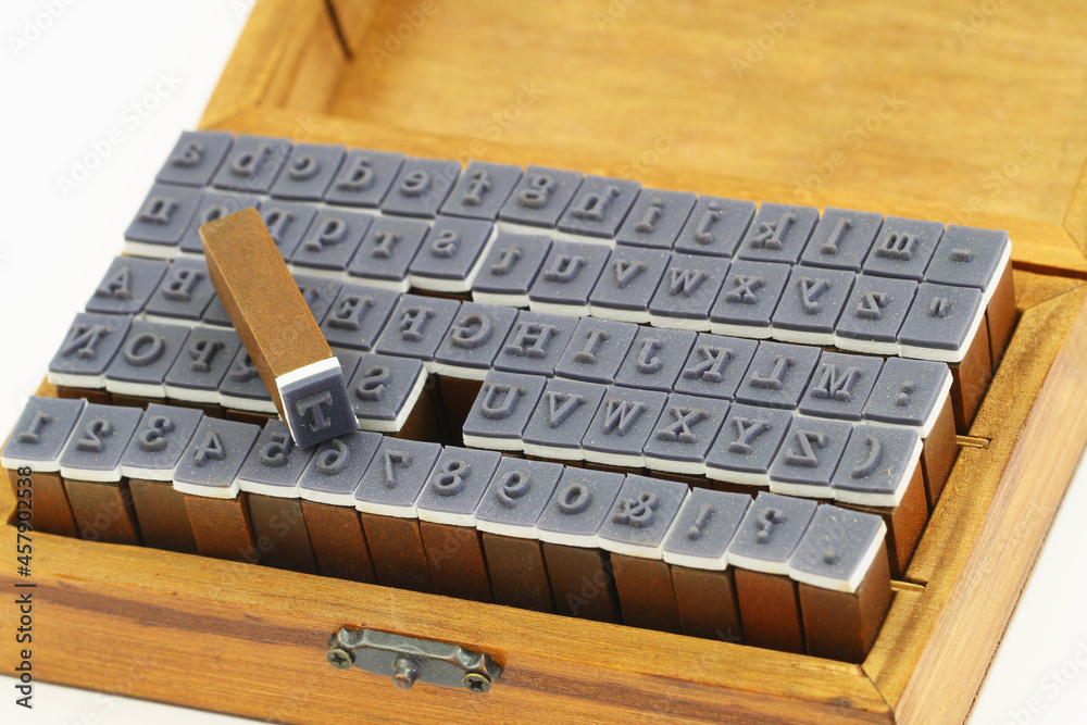 Vintage wooden stamps in old wooden box