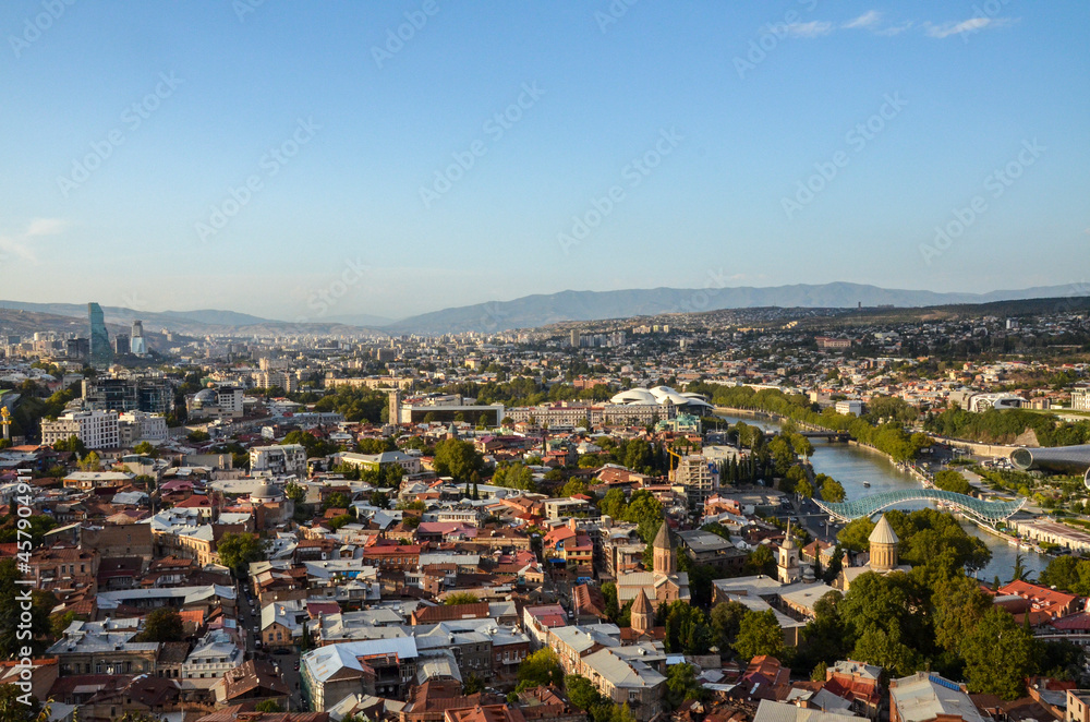 Panoramic view of Tbilisi old town from Narikala fortress, at sunset. Georgia