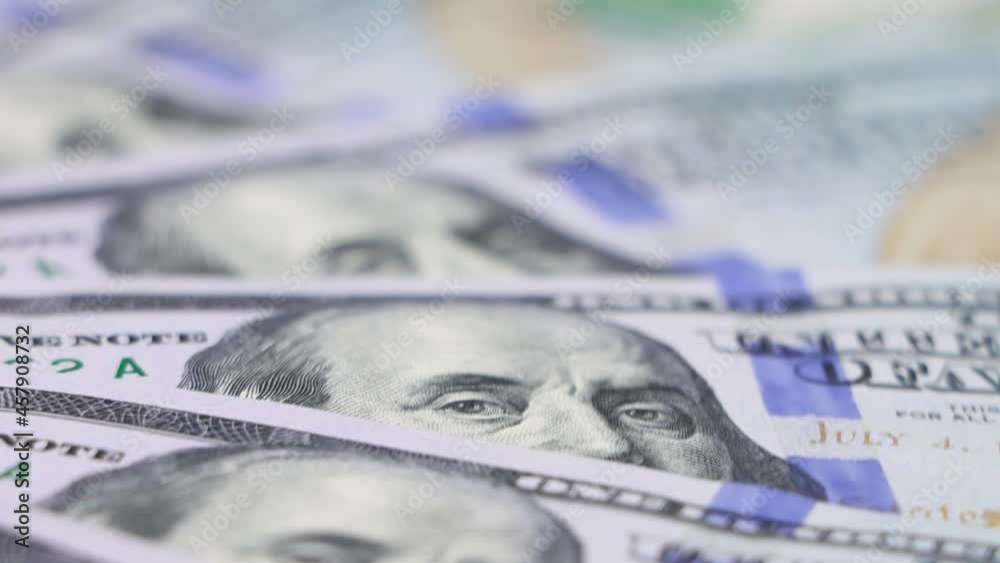 Rotating US dollars banknotes - close-up view Rotating US dollars banknotes - close-up view