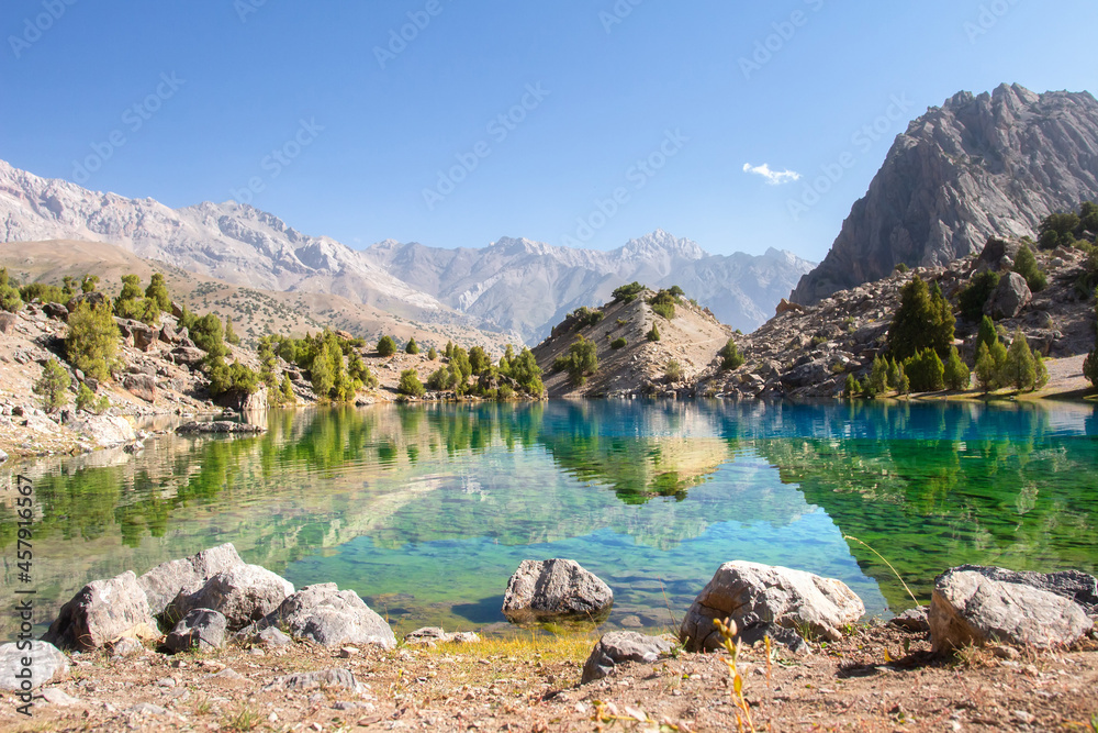 Scenic view on Alaudin lake in Fann moutains. The journey on beutiful places of Fann moutains in Tajikistan.