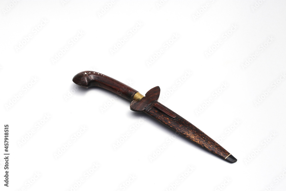Old used Indonesian Knife with handle and knife scabbard made from wooden isolated on white background Old used Indonesian Knife with handle and knife scabbard made from wooden isolated on white background