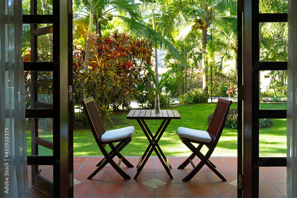 Obraz premium Terrace with a tropical garden